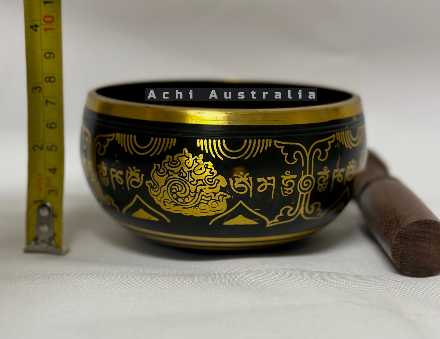 Black Singing Bowl with Mantra symbol.