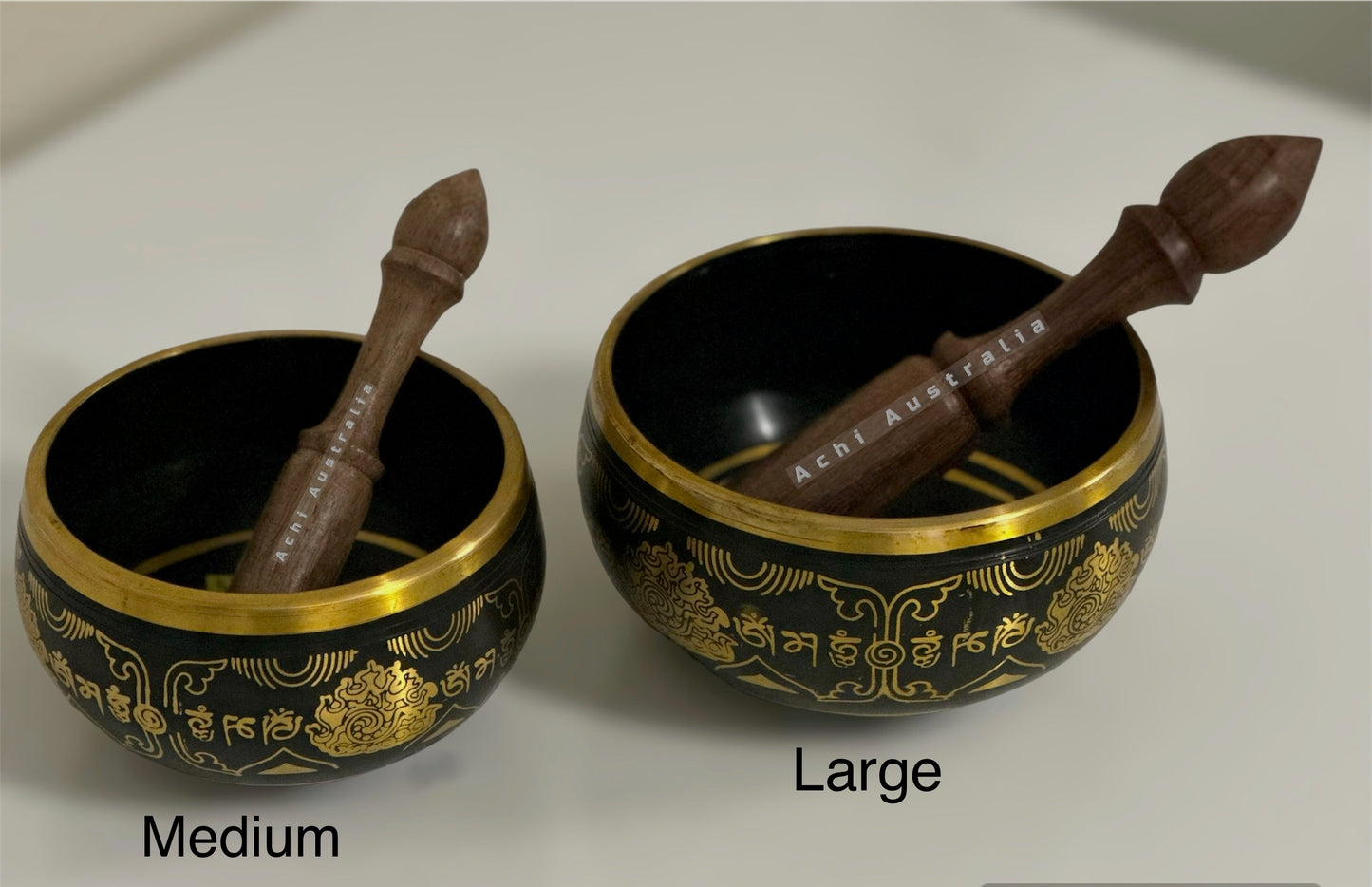 Black Singing Bowl with Mantra symbol.