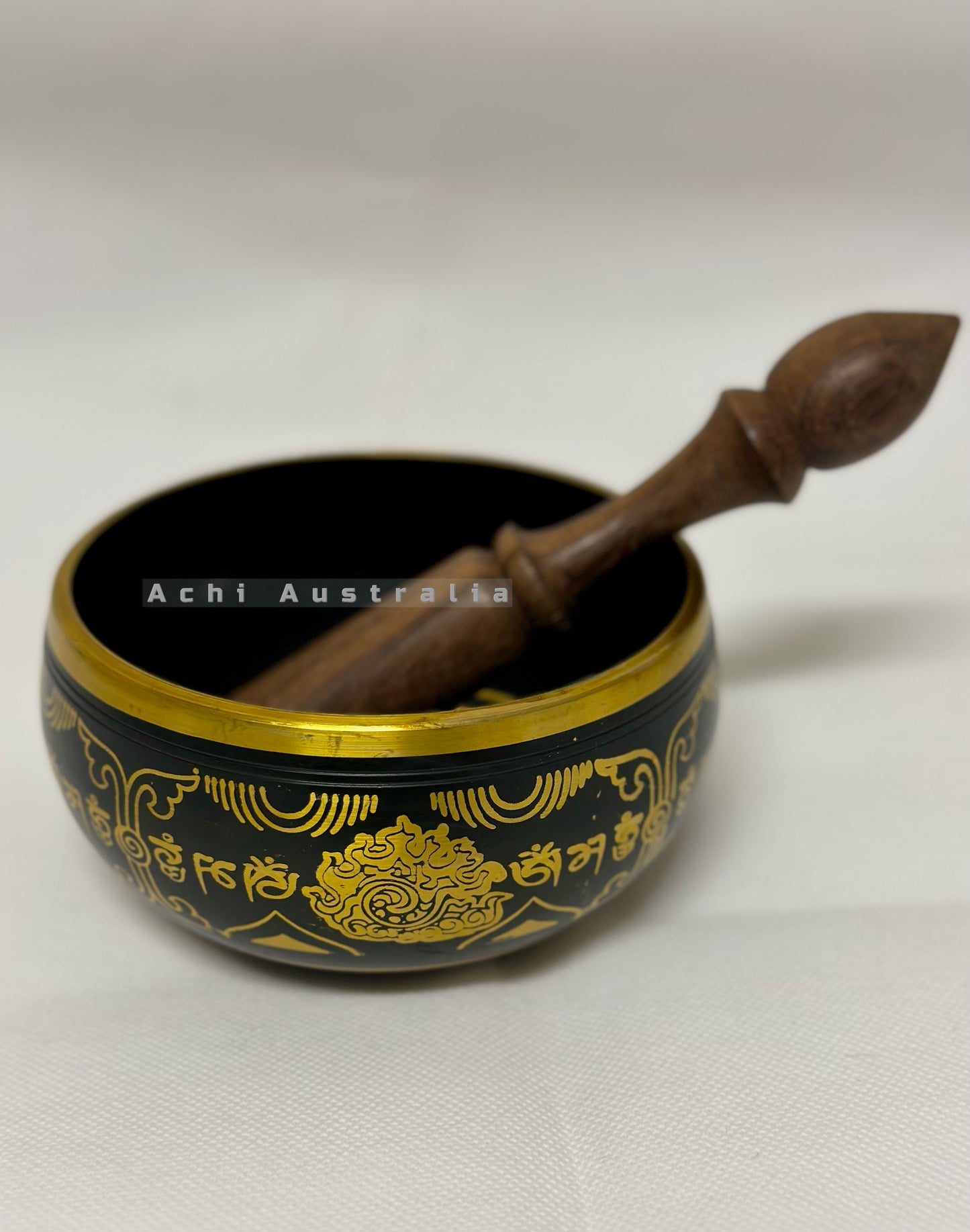 Black Singing Bowl with Mantra symbol.